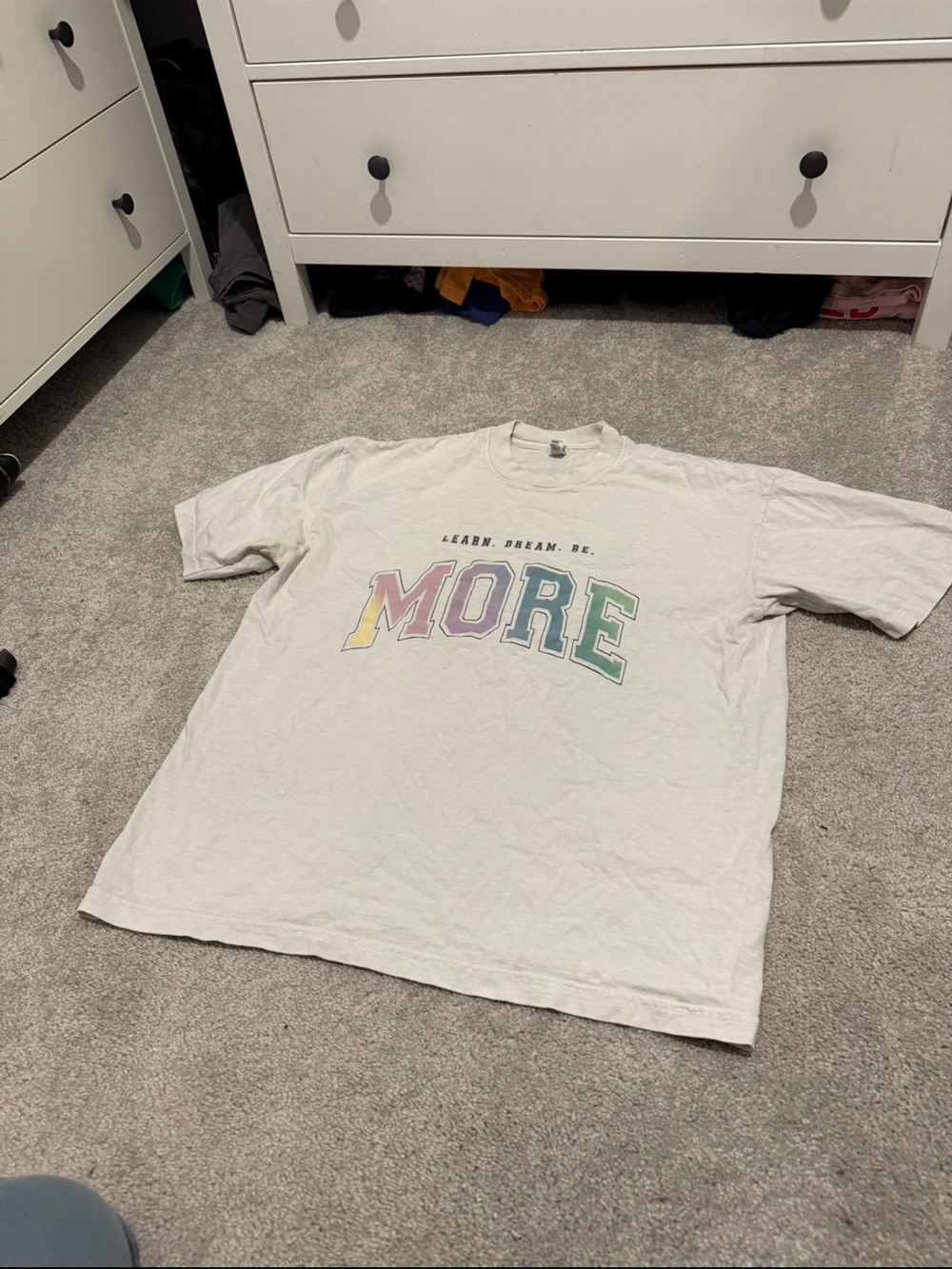 Alphalete White Tee with Pastel Rainbow 'MORE' Graphic